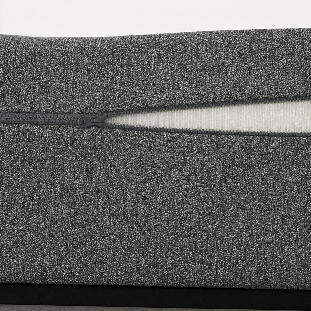 Close-up detail of the South Bay Daisy mattress cover showing the high-quality textured fabric and the functional zipper for a removable cover.

