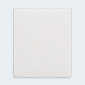 Direct top-down view of the Terra Sleep mattress surface featuring a breathable white stretch-knit cover designed for cooling airflow.
