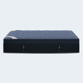 Frontal studio view of the navy blue DreamCloud Luxe 14-inch mattress featuring a premium scalloped quilted surface and supportive side panels.
