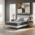 Modern bedroom interior featuring the Comfort Plus 10 Inch Medium Mattress on a minimalist upholstered platform bed frame.
