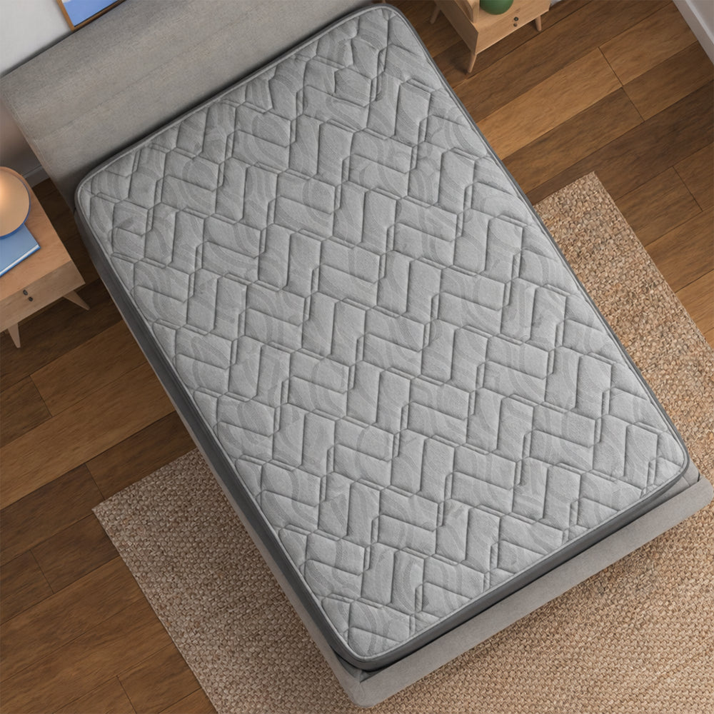 Overhead high-angle shot of the Baird 14-inch mattress highlighting the breathable interlocking quilted pattern for pressure relief and airflow.
