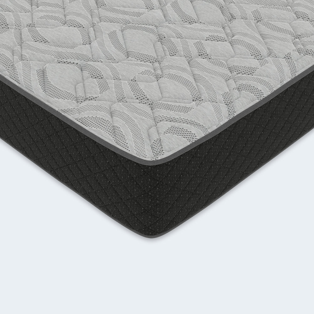 Close-up corner detail of the Griffin 14" Hybrid Mattress by Corsicana highlighting the premium plush quilted grey cover and durable side upholstery.
