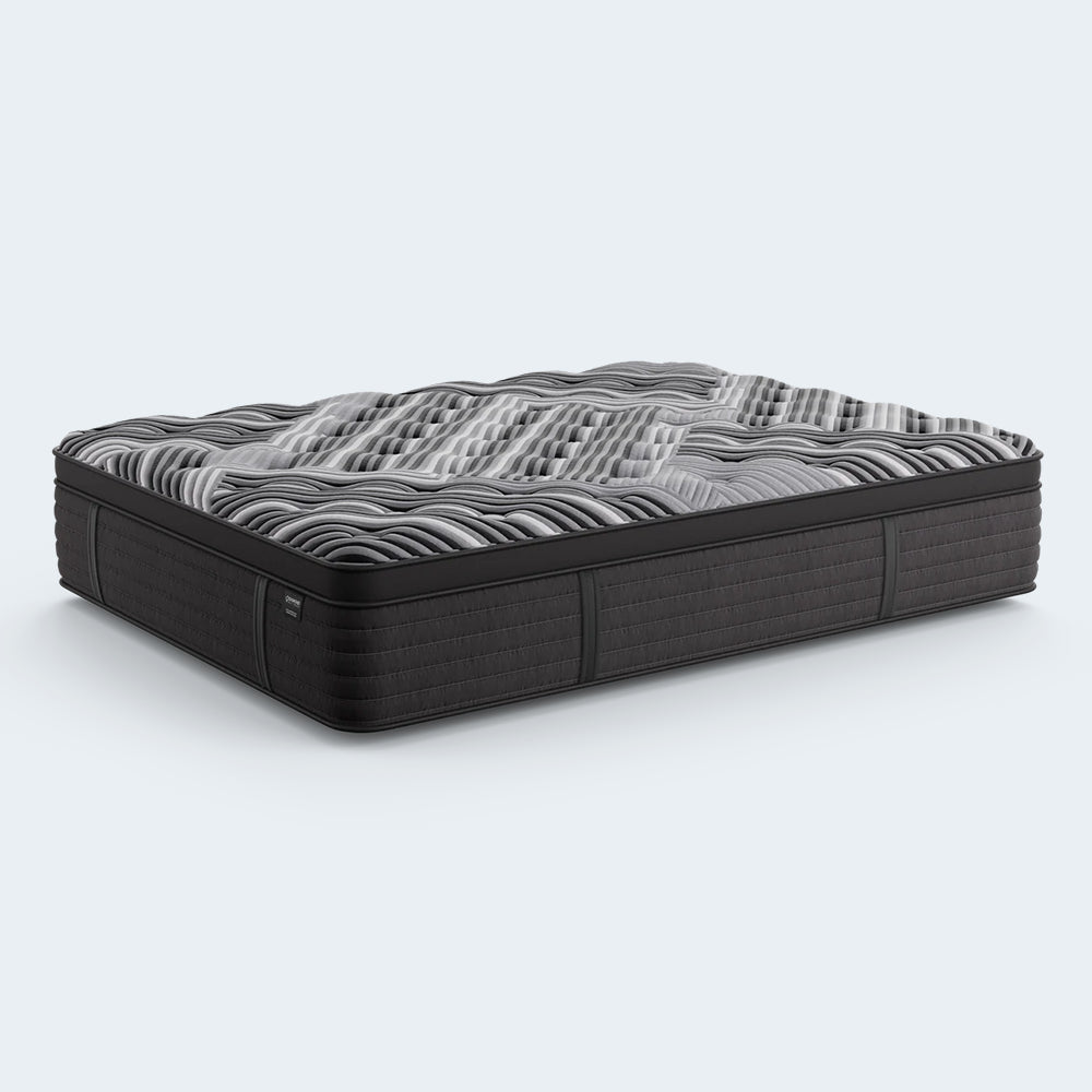 Perspective view of the 15-inch Dreamstage 2.0 Calm Quilted mattress highlighting its deep profile, luxury comfort layers, and charcoal grey side panels.
