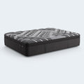 Perspective view of the 15-inch Dreamstage 2.0 Calm Quilted mattress highlighting its deep profile, luxury comfort layers, and charcoal grey side panels.

