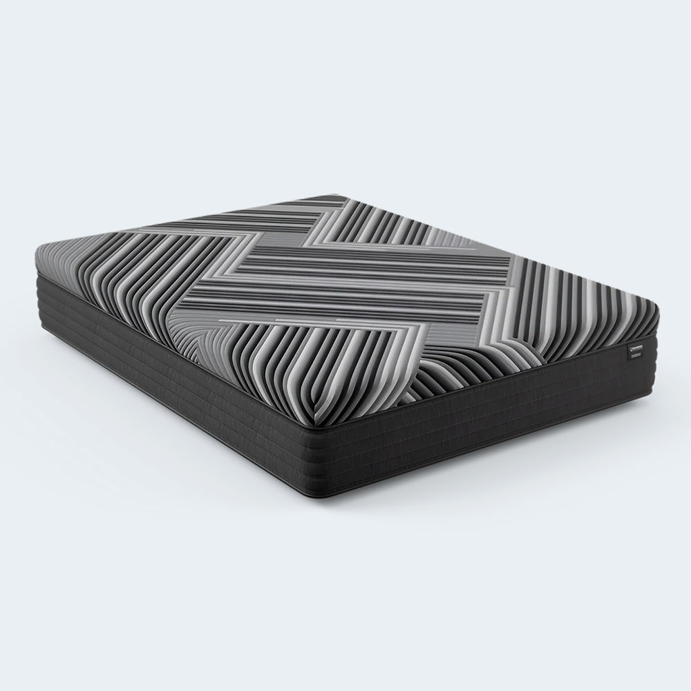 Side angle of the 14-inch Dreamstage 2.0 Calm Hybrid mattress highlighting the luxury hybrid build with pocketed coils and cooling foam.
