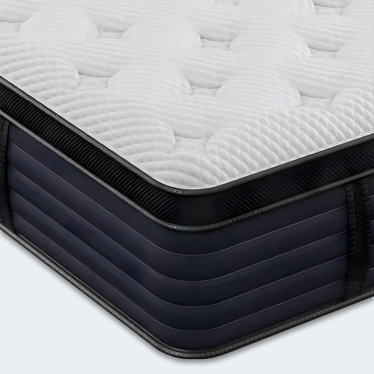 Close-up corner view of the Aspen Hybrid Mattress detailing the cooling fabric and charcoal grey trim.