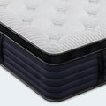 Close-up corner view of the Aspen Hybrid Mattress detailing the cooling fabric and charcoal grey trim.