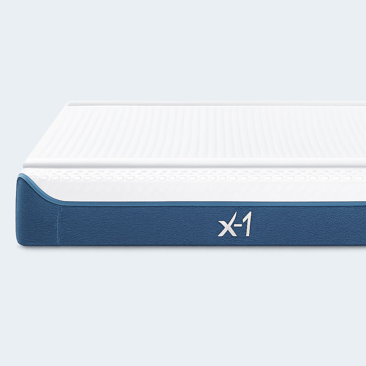 Side profile of the X1 Kids Performance Mattress showing the integrated cooling layers and moisture-wicking top.
