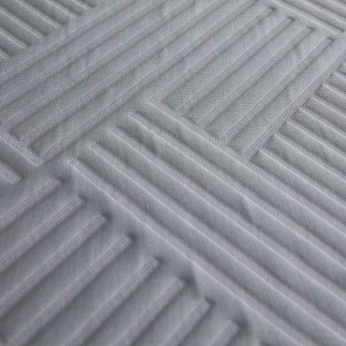 Extreme close-up of the Polaris 12" Aeroflex Hybrid Mattress breathable fabric with raised cooling ridges.