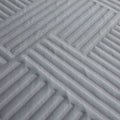 Extreme close-up of the Polaris 12" Aeroflex Hybrid Mattress breathable fabric with raised cooling ridges.