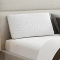 Ergonomic bamboo charcoal memory foam pillow by South Bay styled on a bed for cooling, fresh sleep.
