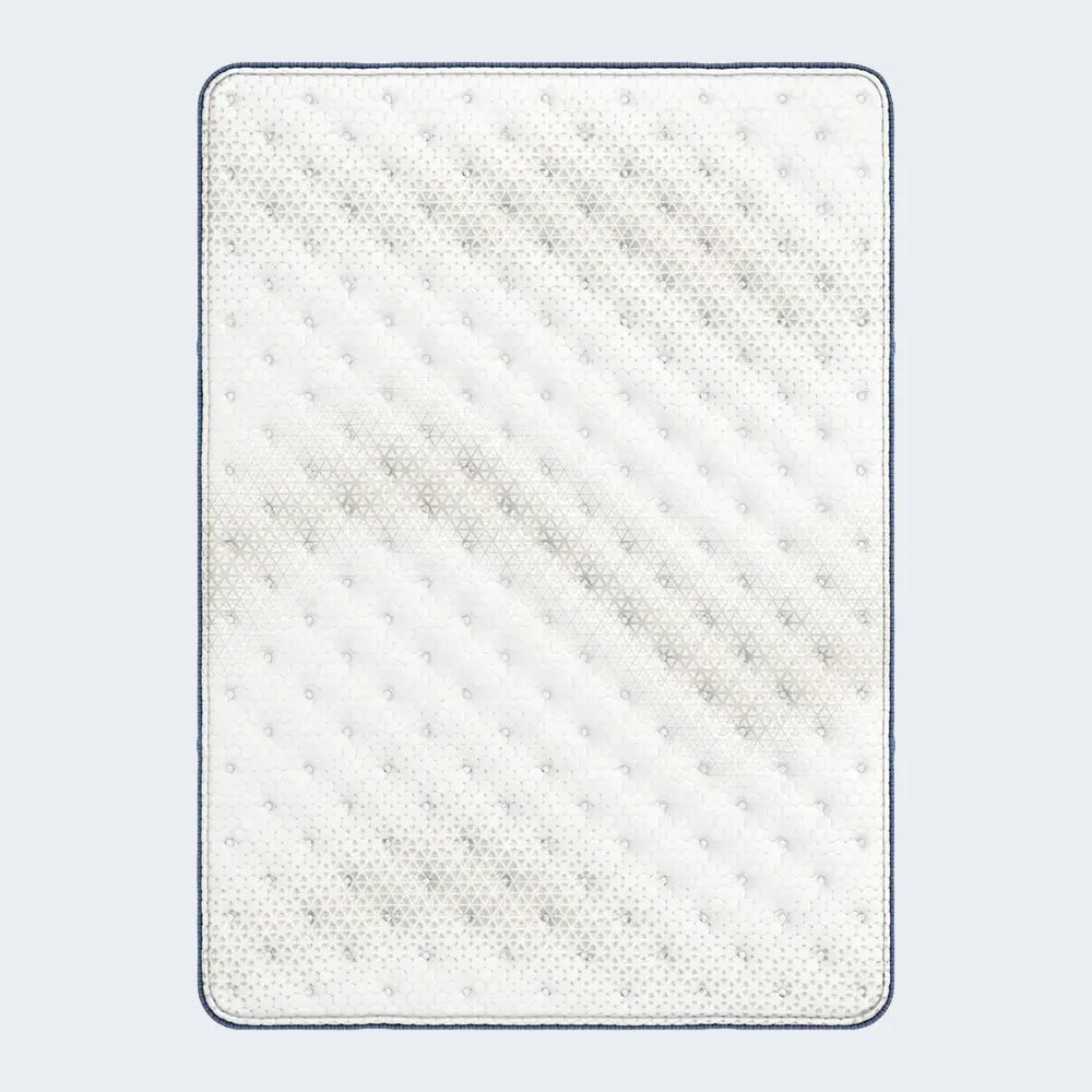 Top-down view of the Serta iComfortPRO Granby extra firm mattress with a geometric quilted pattern.
