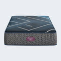 Overhead view of the Beautyrest World Class Hybrid mattress surface featuring a modern geometric pattern.
