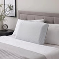 Malouf Bamboo Charcoal pillow with a soft, breathable cooling cover styled on a modern bed for maximum comfort.
