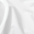Ultra-soft, breathable jersey fabric of the Malouf Prime Mattress Protector for a comfortable sleep surface.
