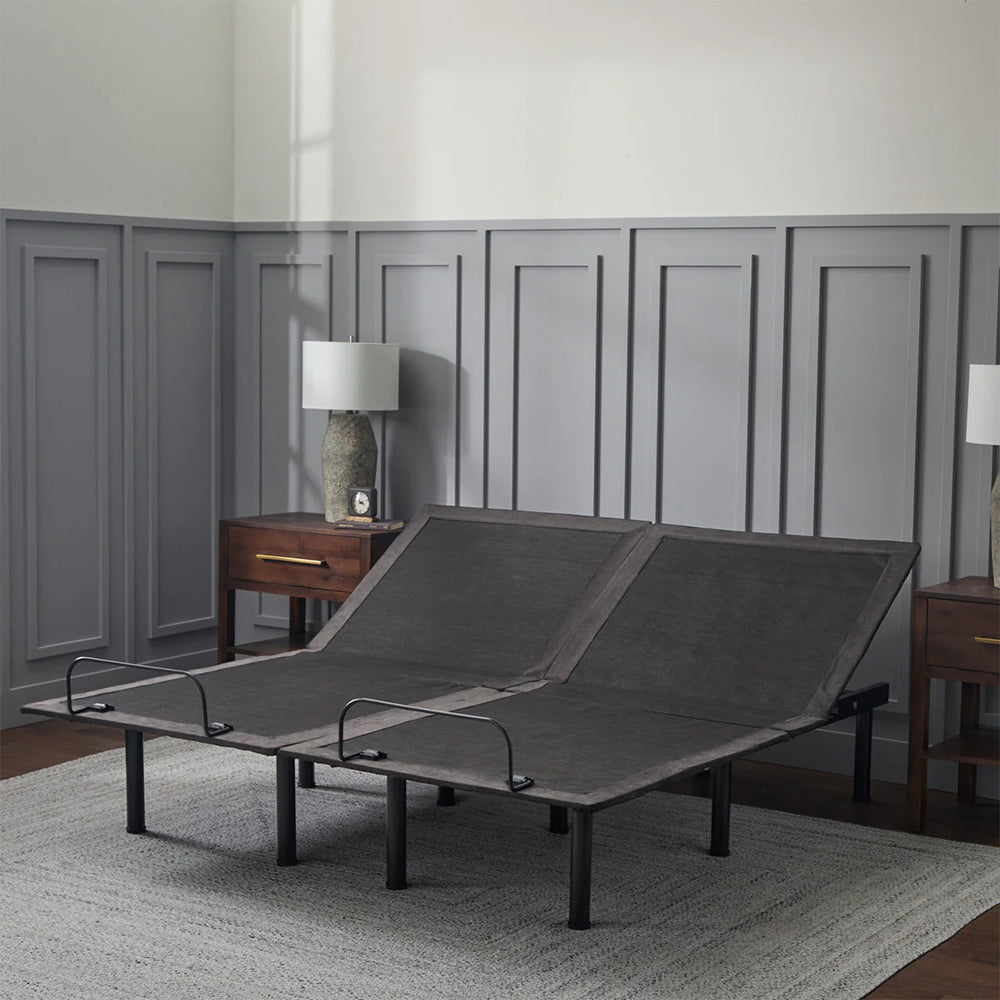 Two Malouf E255 adjustable bed bases side-by-side in a Split King configuration with head sections elevated.
