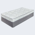 Ashley Sleep Bonnell 6 inch firm mattress paired with a matching grey upholstered foundation for durability.
