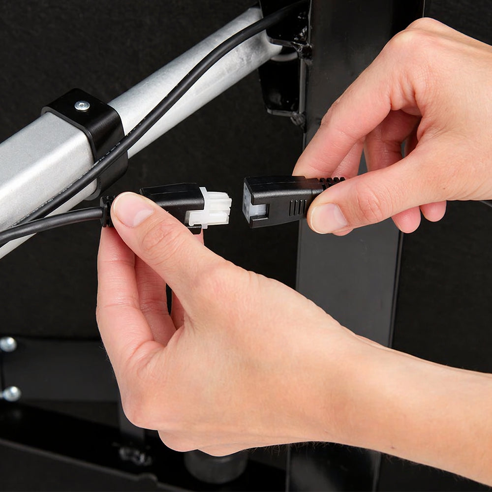 Close-up of the easy-to-connect motor cables for the Weekender 50 Series adjustable power base by Malouf.

