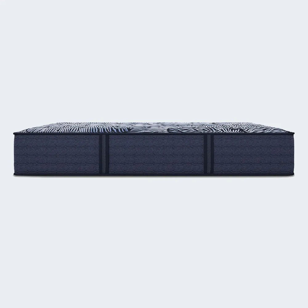 Profile of the 13.5 inch Serta Knox Firm mattress featuring a durable dark grey quilted border.
