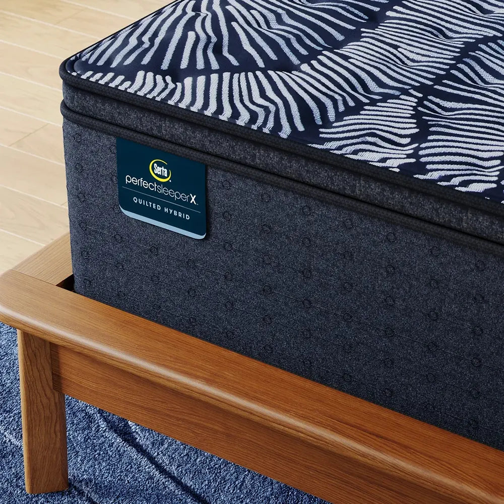 Profile view of the 14.25 inch Serta Lexton hybrid mattress showcasing its supportive multi-layer construction.
