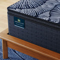 Profile view of the 14.25 inch Serta Lexton hybrid mattress showcasing its supportive multi-layer construction.

