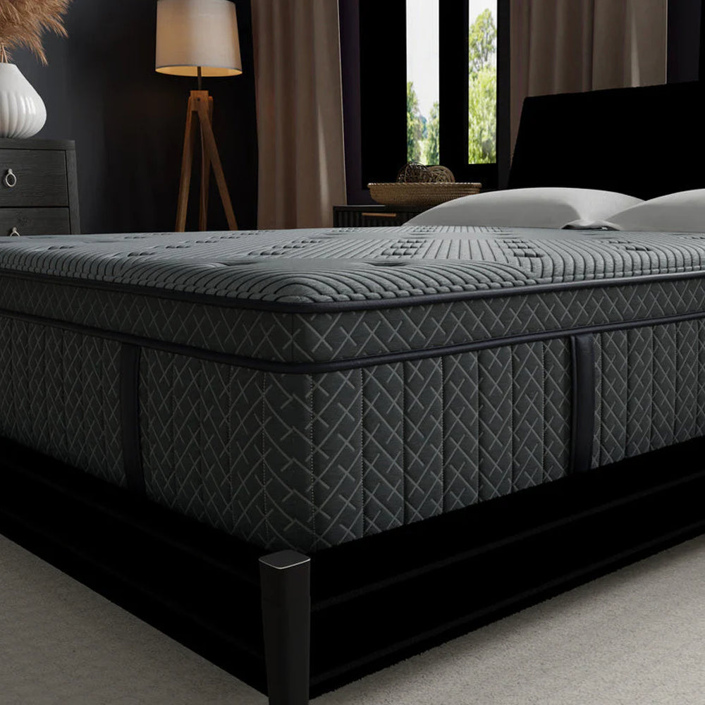 Close-up corner shot of the Allureluxe Classic Bamboo Hybrid mattress by South Bay showing the quilted cooling cover and durable edge.
