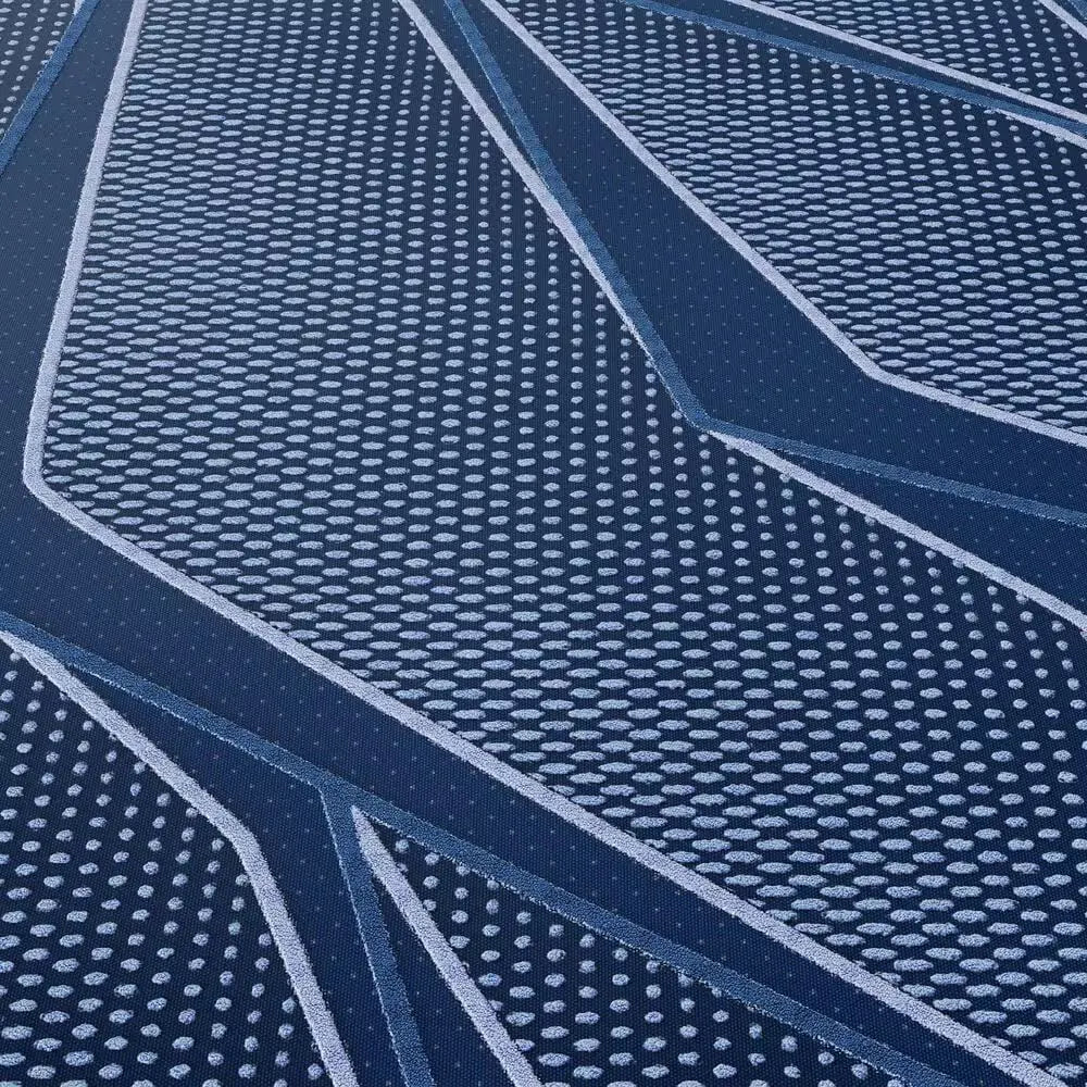 Close-up of the cooling geometric fabric on the Serta iSeries NXG 3500 13.5" medium hybrid mattress.
