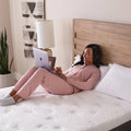 Supportive GhostPillow Faux Down pillow used for reading or working in bed with cooling comfort.
