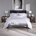 SleepTone 6-piece hotel luxury sheet set in white with classic gold double-stripe embroidery.
