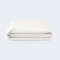 Folded SleepTone SmartGuard mattress protector featuring breathable IceTone cooling technology and soft knit.
