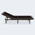 Side profile of the Comfort Premier Steel motorized bed frame by Ashley with the head fully elevated for watching TV in bed.
