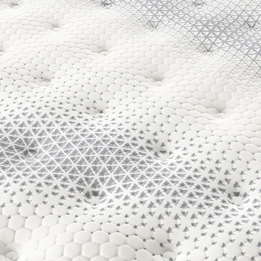 Close-up of the breathable geometric quilted pattern on a Serta iComfortPRO Dartmouth mattress.

