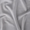 Macro texture of grey Hyper-Linen performance fabric, designed for airflow and soft baby comfort.
