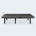 Side profile of the iDealBed Smart 6i wireless adjustable bed base in the flat position showing the upholstered deck and steel legs.
