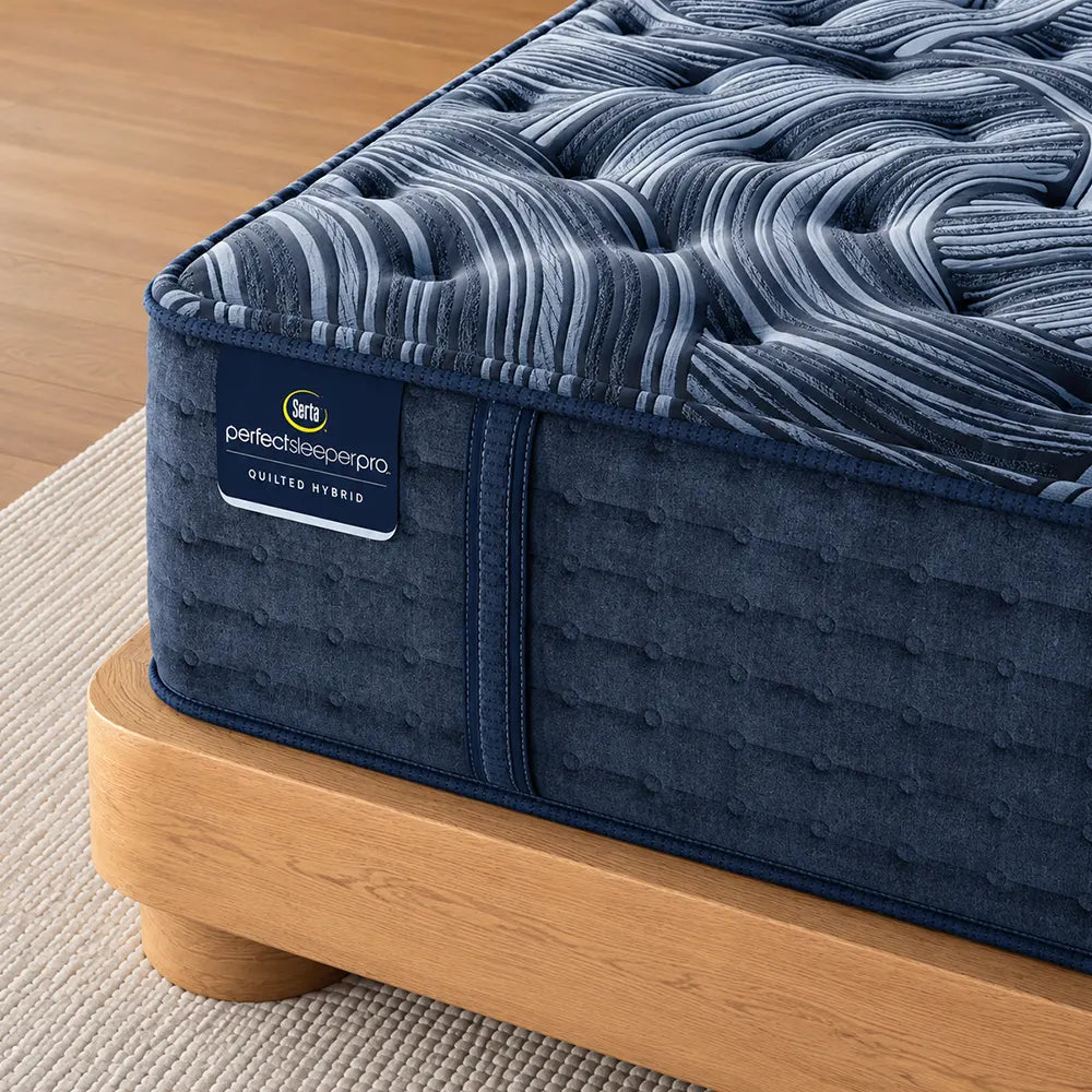 Close-up of the Serta Perfect Sleeper Pro Paris 15 inch mattress corner highlighting the quilted hybrid texture.
