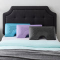 Malouf Zoned Dough pillows in lavender, cooling gel, and charcoal with ergonomic shoulder cutouts.