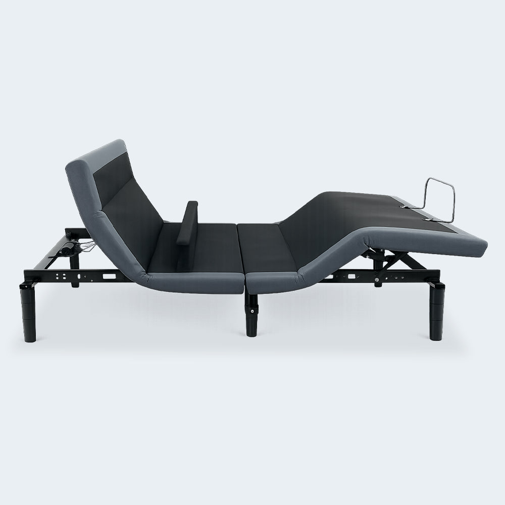 Side profile of the Customatic Opus motorized bed base in a Zero Gravity position showing full frame articulation and pillow tilt functionality.
