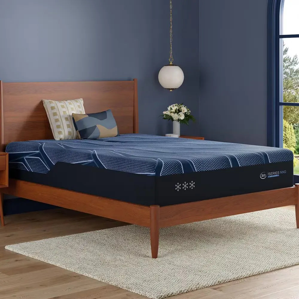 Serta iSeries NXG 4500 ultra plush mattress on a wooden frame, perfect for side sleepers needing support.
