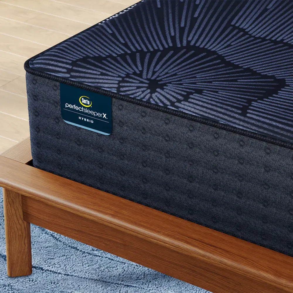 Close-up of Serta Perfect Sleeper X branding on the Prescott 14 Inch Plush Hybrid Mattress side panel.
