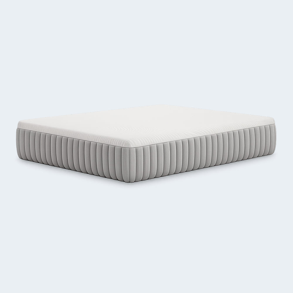 Profile studio shot of the Terra Sleep 12-inch mattress by Ashley Sleep on a black supportive foundation, showcasing its luxury height and sleek border.
