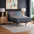 Ashley 13-inch firm hybrid mattress with the head section elevated on a motorized adjustable base in a luxury bedroom setting.
