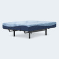 Side profile of the Peak 2.0 10-inch mattress by Ashley Sleep demonstrating flexibility and compatibility with motorized adjustable bed foundations.
