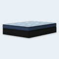 Side profile shot of the Peak 2.0 8-inch medium mattress illustrating the durable quilted cover and 8-inch supportive height.
