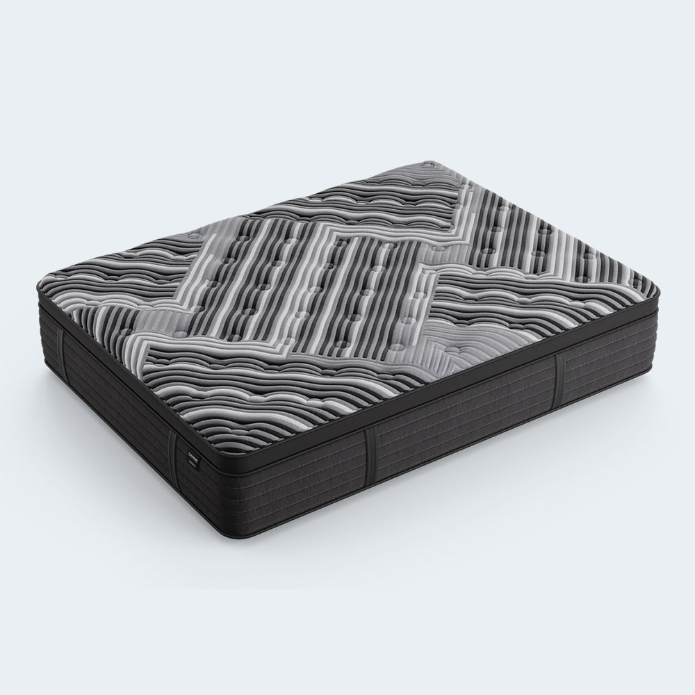 Side-angle view of the Diamond Mattress Dreamstage 2.0 Calm Quilted 15-inch luxury mattress featuring a thick quilted wave-pattern cooling cover.

