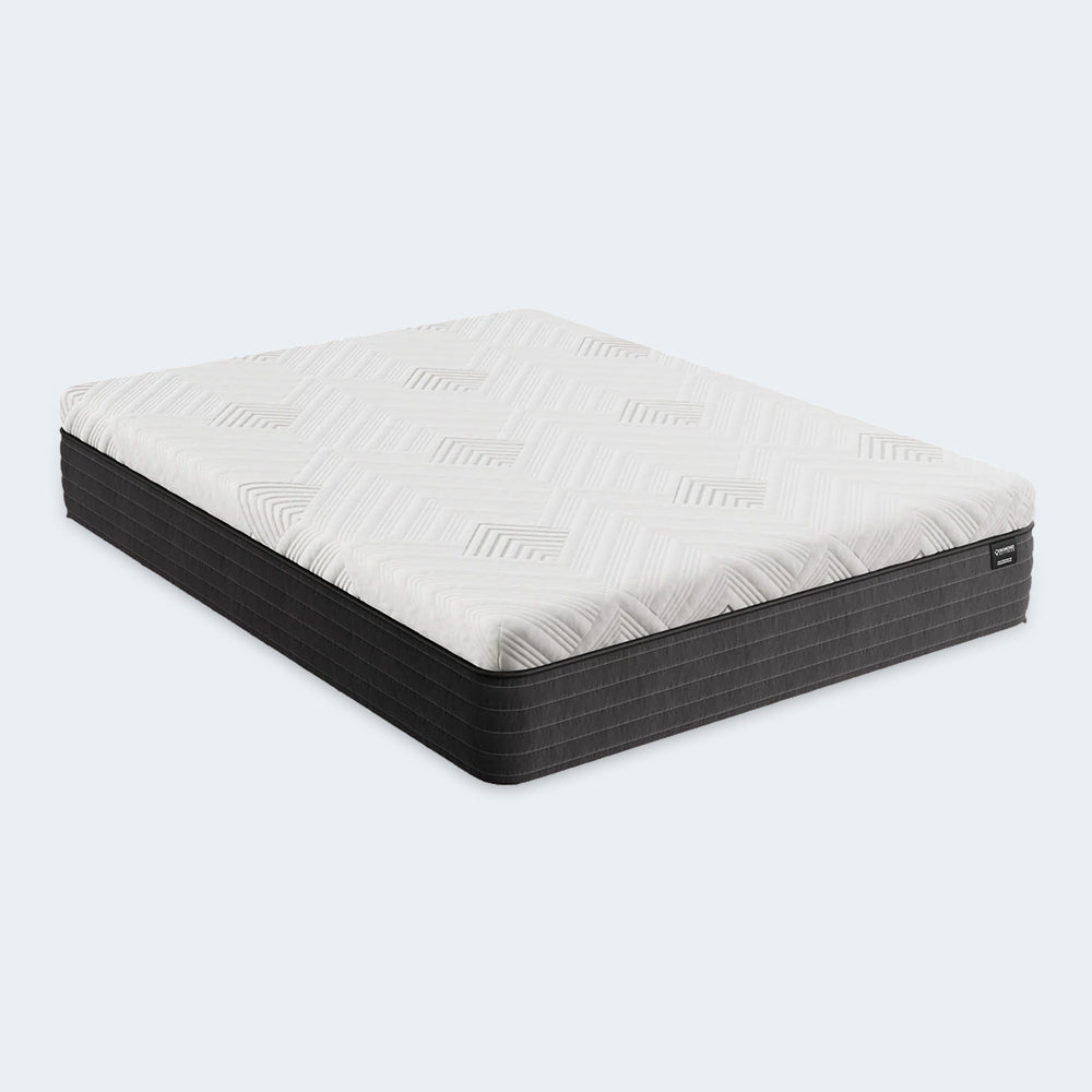 Side angle view of the Diamond Mattress Dreamstage 2.0 Gilded 12-inch All Foam mattress showing the geometric quilted cooling cover and dark grey border.
