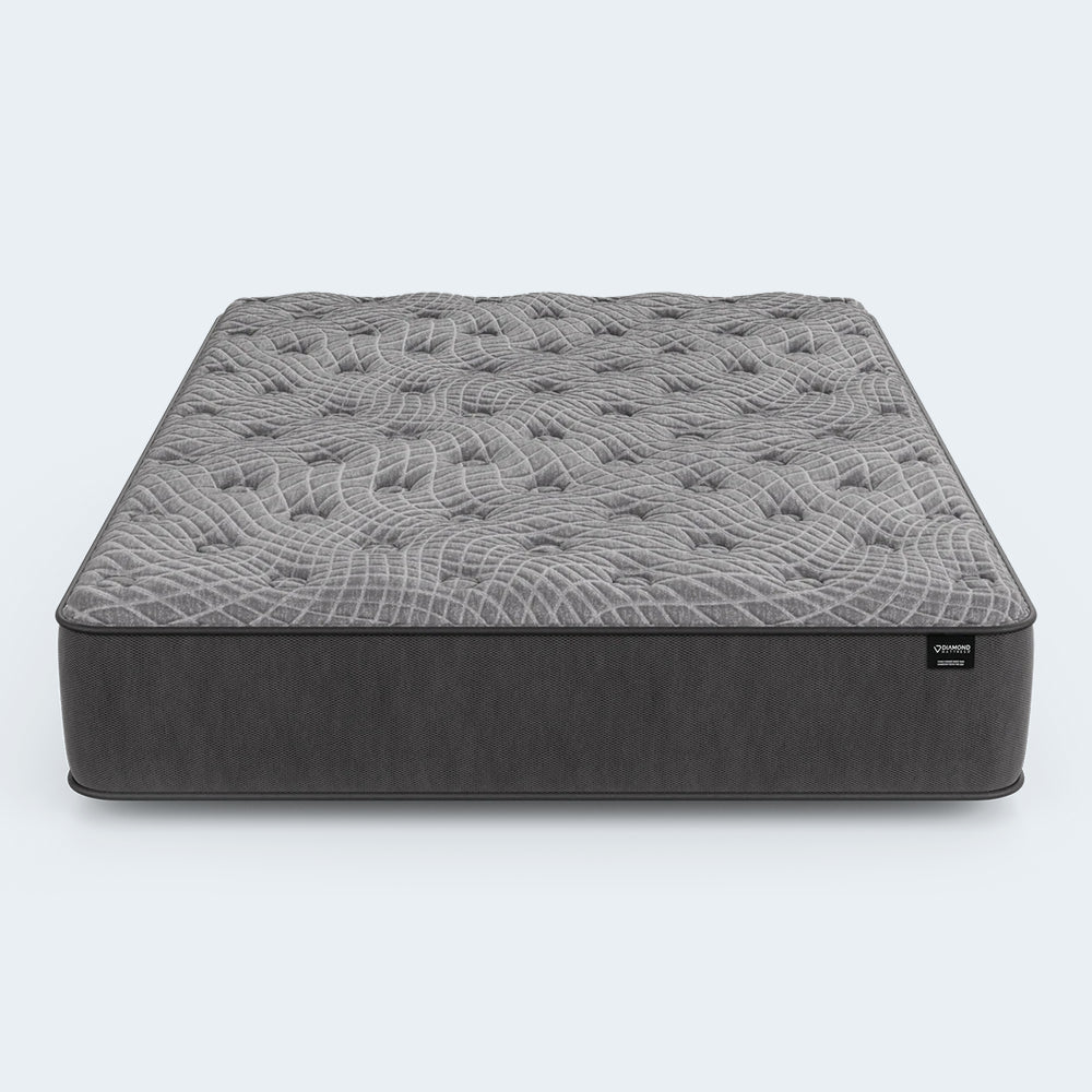 Frontal view of the Dreamstage 2.0 Genuine Quilted 12" Mattress by Diamond Mattress featuring a breathable grey textured cover.
