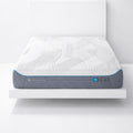 Front view of the H6 Hybrid Performance Mattress highlighting the grey mesh side panels and H6 firmness level tag.