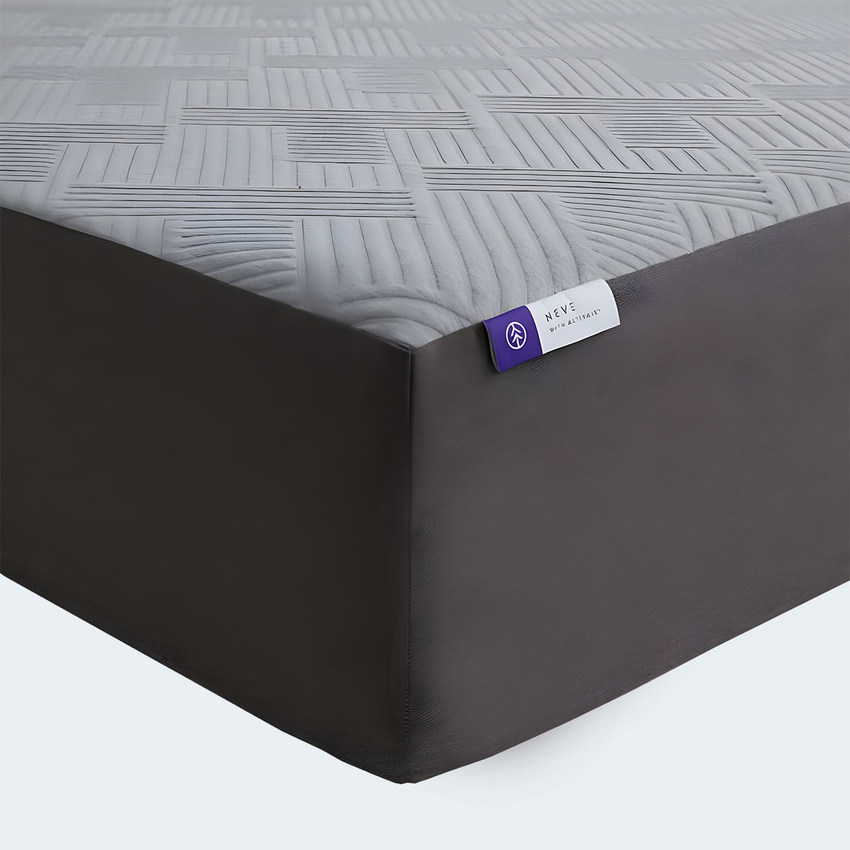 Close-up of the Neve 10" Activair All-Foam Mattress corner featuring a purple brand tag and geometric fabric.