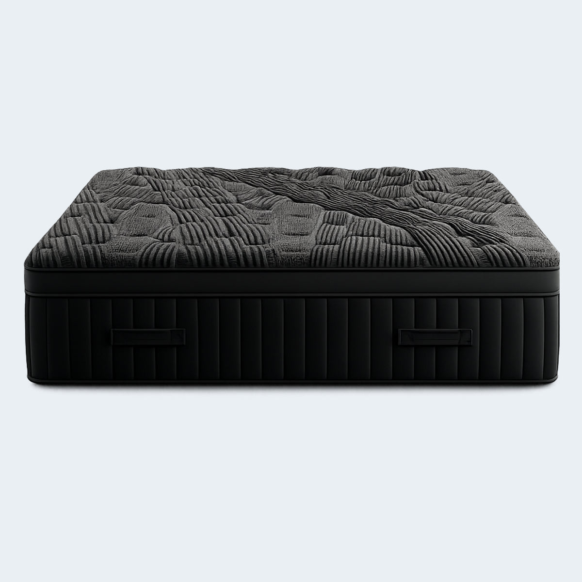 Front edge profile of the Black Diamond Lux 15-inch mattress showcasing the built-in carrying handles and deep channel quilting.
