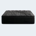 Front edge profile of the Black Diamond Lux 15-inch mattress showcasing the built-in carrying handles and deep channel quilting.
